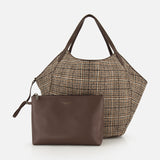 A large brown-and-white Wool Check & Suede Large Reversible Bag by BRUNELLO CUCINELLI featuring leather handles, paired with a matching dark brown leather zippered pouch.
