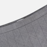 Close-up of the BRUNELLO CUCINELLI Wool Contemporary Pleated Skirt in grey, highlighting the waistband and intricate diagonal pleats against a white background—a refined choice for an elegant office look.