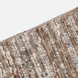 Close-up of the BRUNELLO CUCINELLI Wool Diamante Boucle Tweed Mini Skirt, showcasing its textured brown and cream woven fabric with metallic threads and delicate sequin embroidery, made in Italy, displayed at an angle against a white background.
