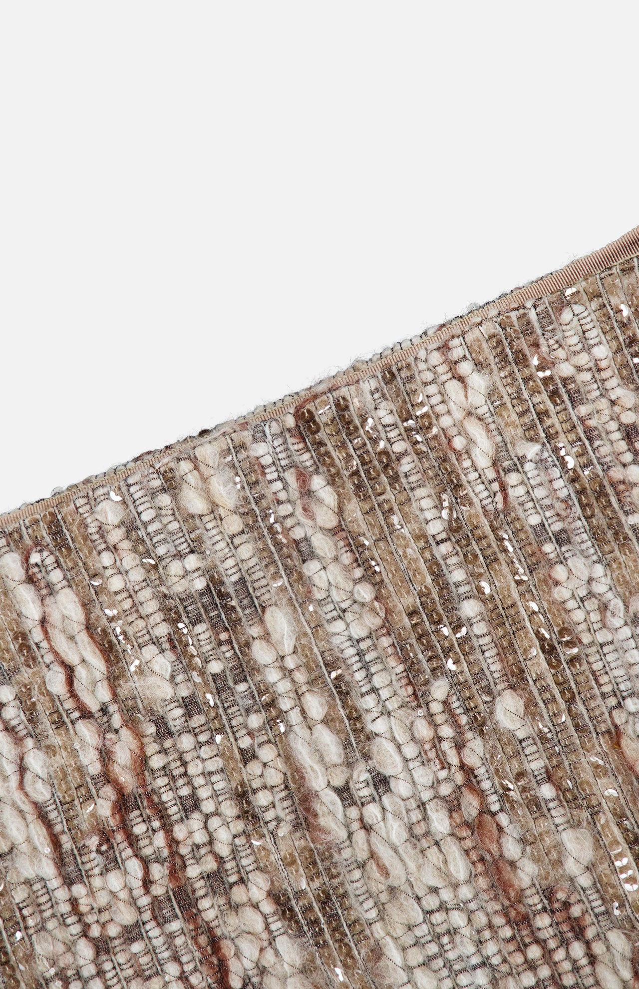 Close-up of the BRUNELLO CUCINELLI Wool Diamante Boucle Tweed Mini Skirt, showcasing its textured brown and cream woven fabric with metallic threads and delicate sequin embroidery, made in Italy, displayed at an angle against a white background.