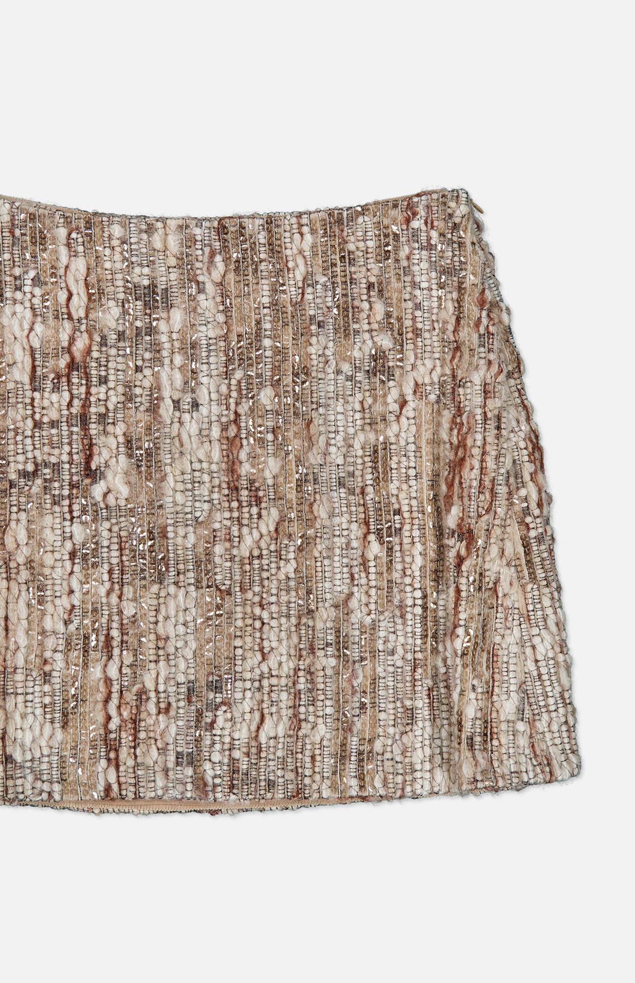 A close-up of a textured, woven beige and brown fabric with vertical rows of metallic and woolen threads, reminiscent of the exquisite craftsmanship found in the Wool Diamante Boucle Tweed Mini Skirt by BRUNELLO CUCINELLI.