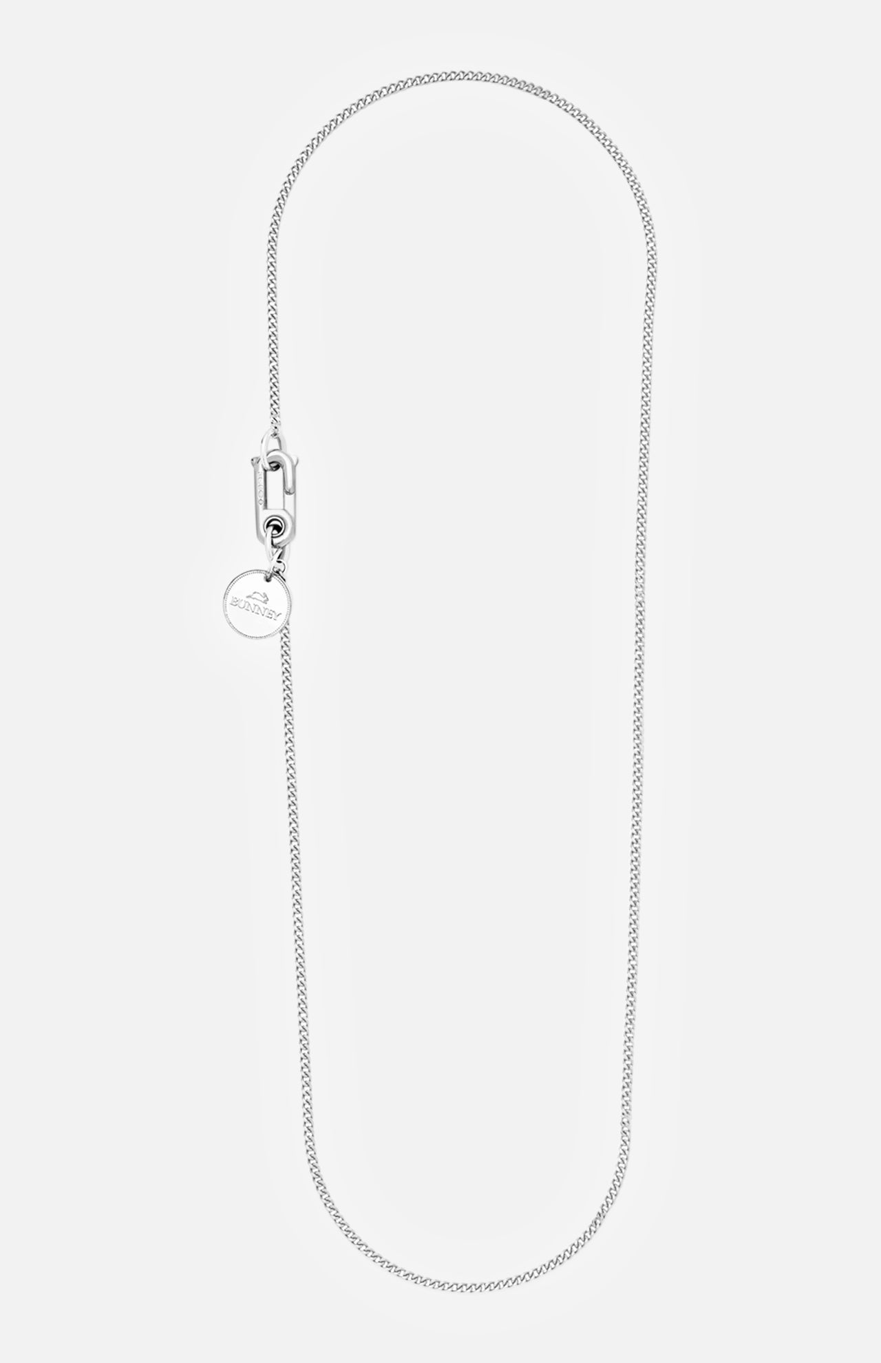 The BUNNEY Chain with Hook & Coin Necklace 60cm is a slim sterling silver chain with a small round pendant and rectangular clasp, shown on a plain white background.