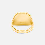 A close-up of the BUNNEY Mini Cushion Signet Ring in yellow gold, featuring a smooth, polished finish and an engraved logo inside the band, shown against a plain white background.