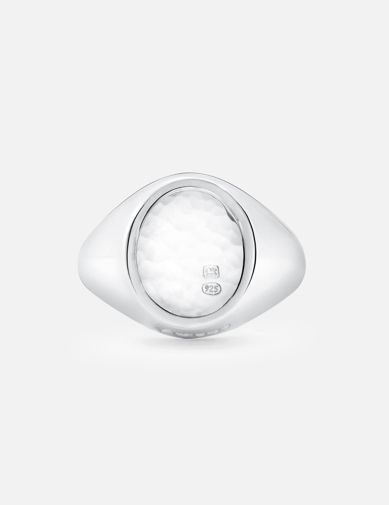 An Oval Signet Ring by BUNNEY, crafted in sterling silver with hallmark stamps and a textured white oval center, is shown against a plain light gray background.