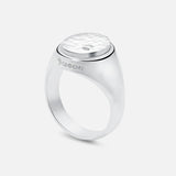 The BUNNEY Oval Signet Ring features a hammered-texture, oval sterling silver face with hallmark side stamps, showcased on a white background—a refined piece of handmade UK jewelry craftsmanship.