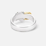 The BUNNEY Precious Wares Belt Ring, crafted in sterling silver with a smooth band and subtle gold accent inside, is displayed against a plain white background.