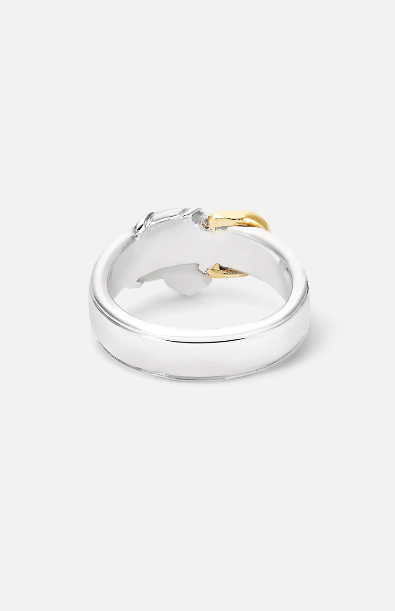 The BUNNEY Precious Wares Belt Ring, crafted in sterling silver with a smooth band and subtle gold accent inside, is displayed against a plain white background.