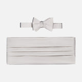The CARROT & GIBBS Cummerbund Bowtie Set in silver satin is displayed on a white background, ideal for elevating your formalwear with a refined touch.