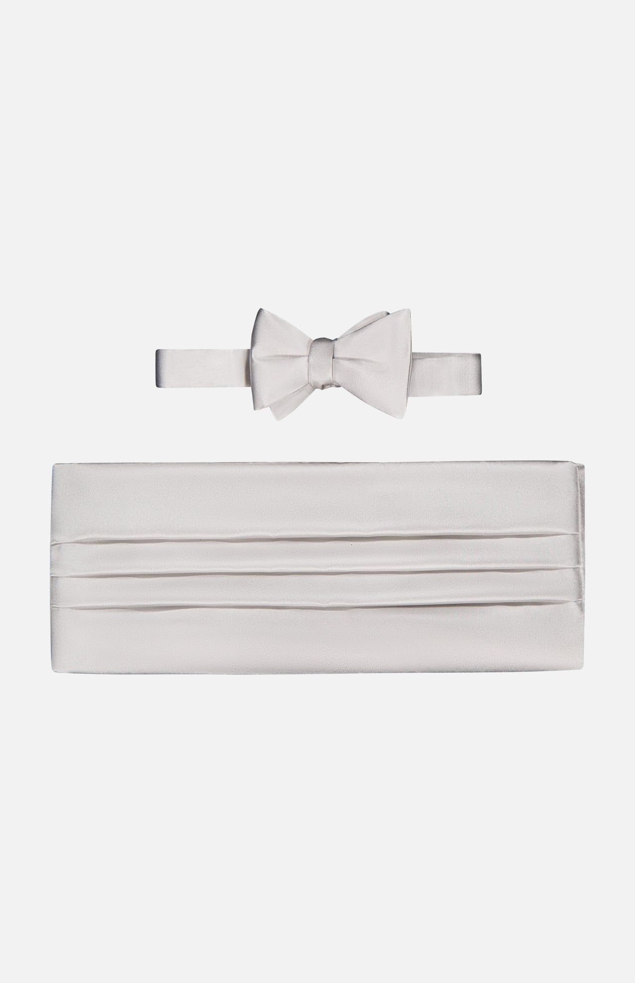 The CARROT & GIBBS Cummerbund Bowtie Set in silver satin is displayed on a white background, ideal for elevating your formalwear with a refined touch.