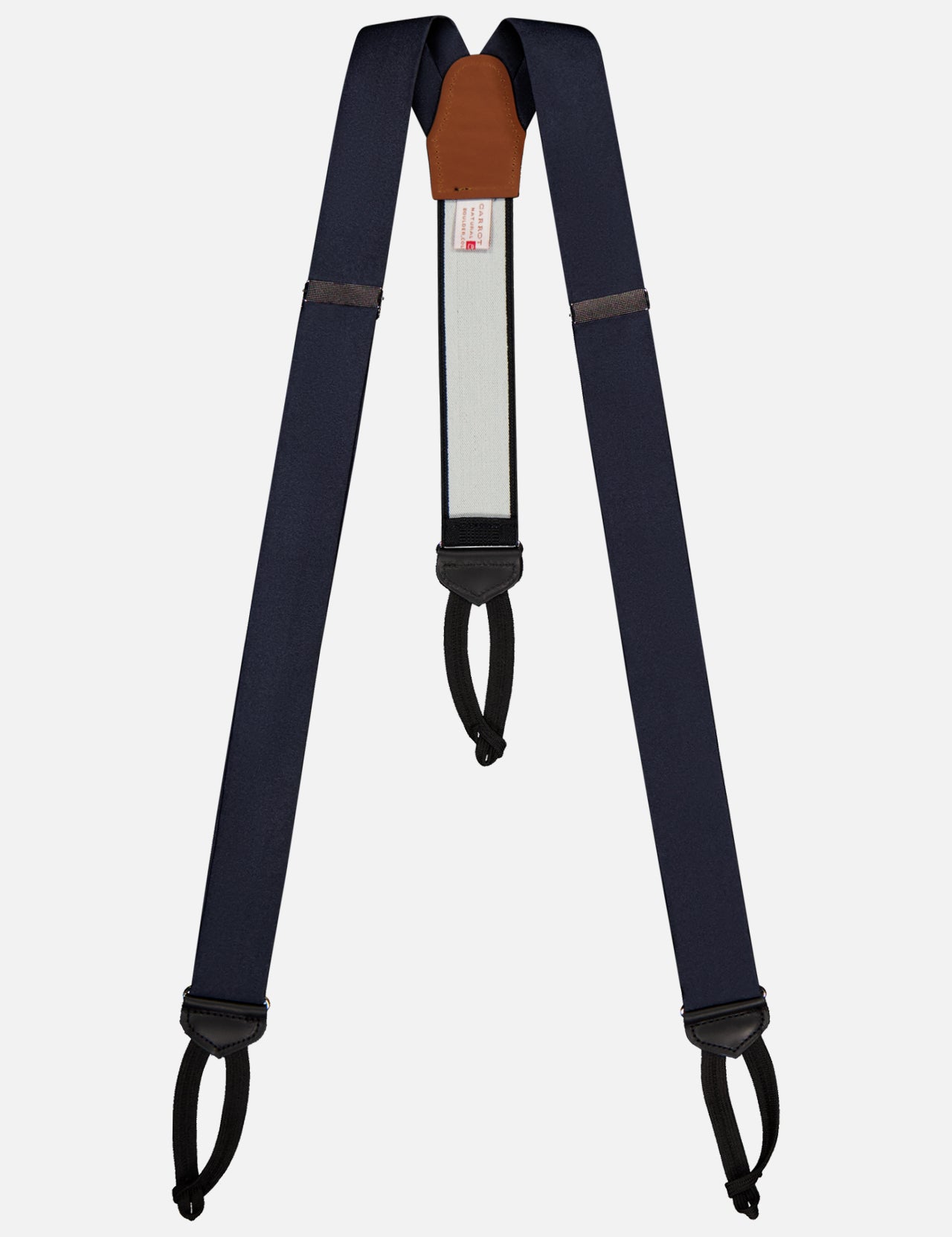 CARROT & GIBBS Satin Suspenders feature navy satin, black leather loops, a brown leather back patch, and adjustable sliders—handcrafted formal accessories displayed flat on a white background.