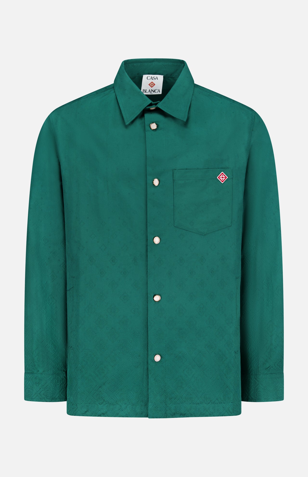 The CASABLANCA Piquet Logo Long Sleeve Shirt features a teal hue, classic collar, front chest pocket with a red and white embroidered patch, white buttons, and a subtle textured pattern.