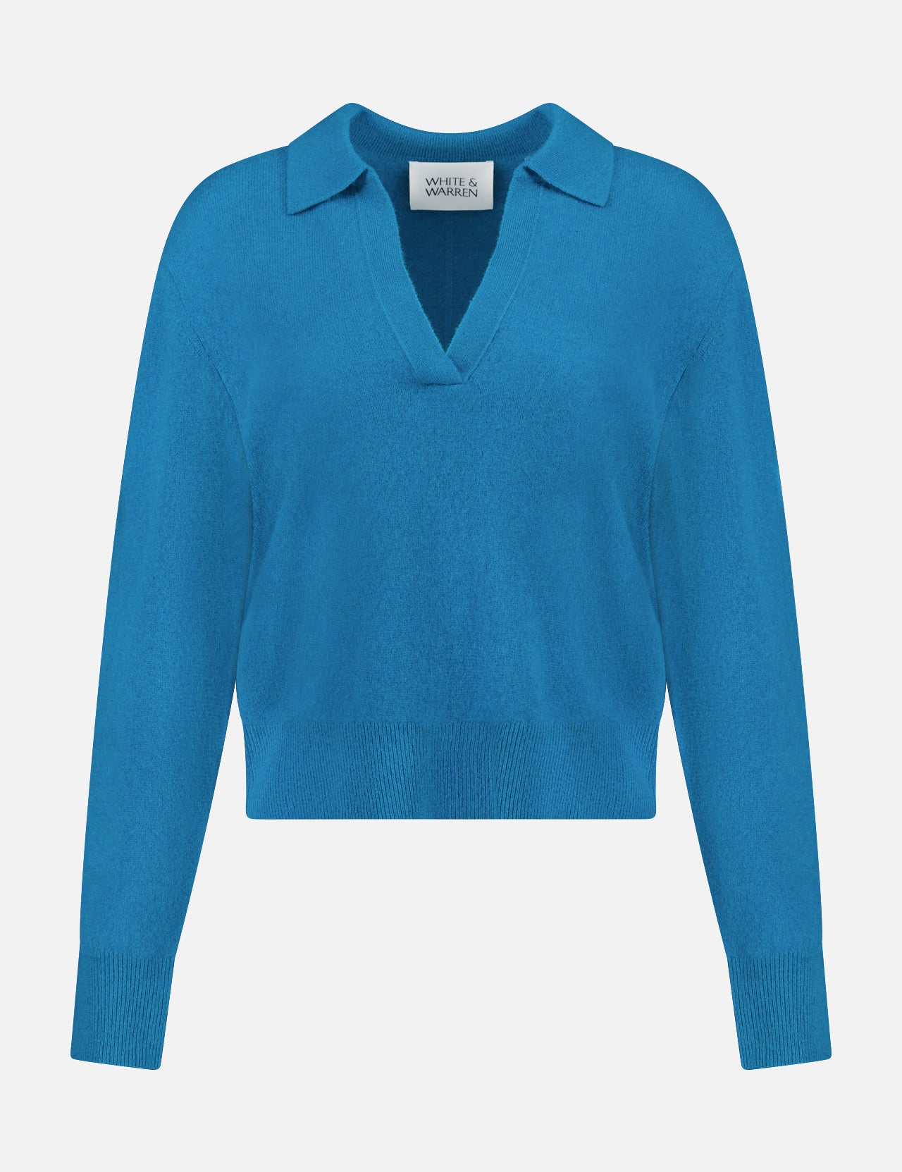 The WHITE + WARREN Cashmere Open Collar Polo Top is a bright blue Mongolian cashmere long-sleeve sweater with a V-neckline, collar, and ribbed cuffs and hem, shown on a plain white background.