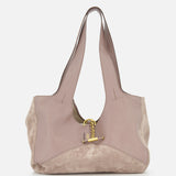 The CHLOÉ Balloon Sling Bag features taupe leather and suede, double handles, and a gold-tone turn-lock closure, shown against a white background.