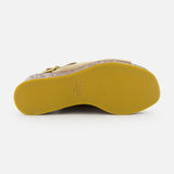 The image shows the sole of a CHLOÉ Maxime Carved Wedge Heel with a smooth mustard yellow bottom. “CHLOÉ,” size 37, and “made in Italy” are stamped in gold on the arch area of the sole.