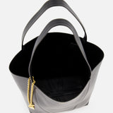 The CHLOÉ Spin Bag with Chain is a minimalist black leather designer handbag, shown from above with an open top and empty interior against a white background.