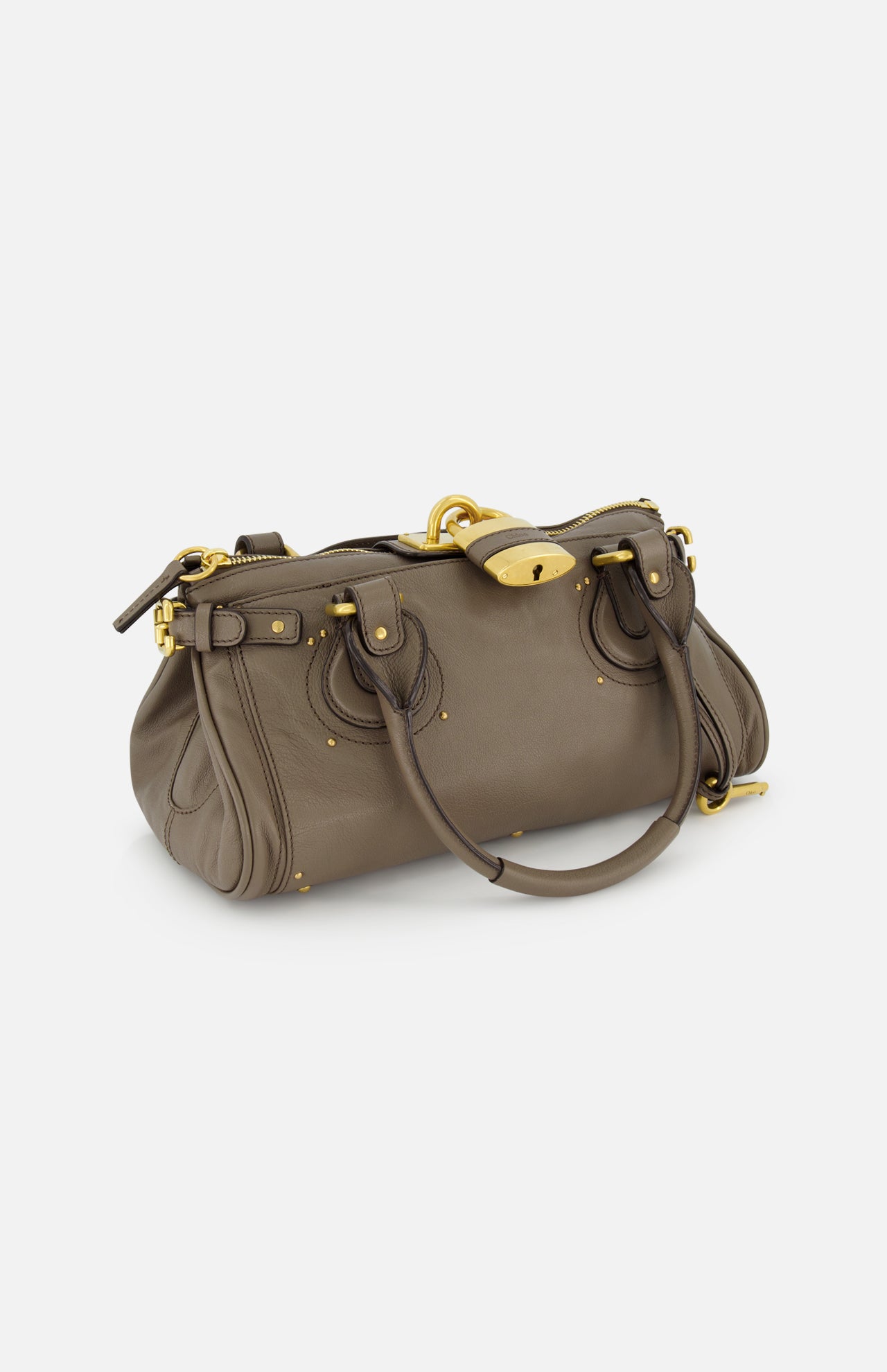 A CHLOÉ Paddington Shoulder Bag in brown buffalo leather with gold hardware, double handles, decorative buckle accents, and a clasp closure, shown on a plain white background.