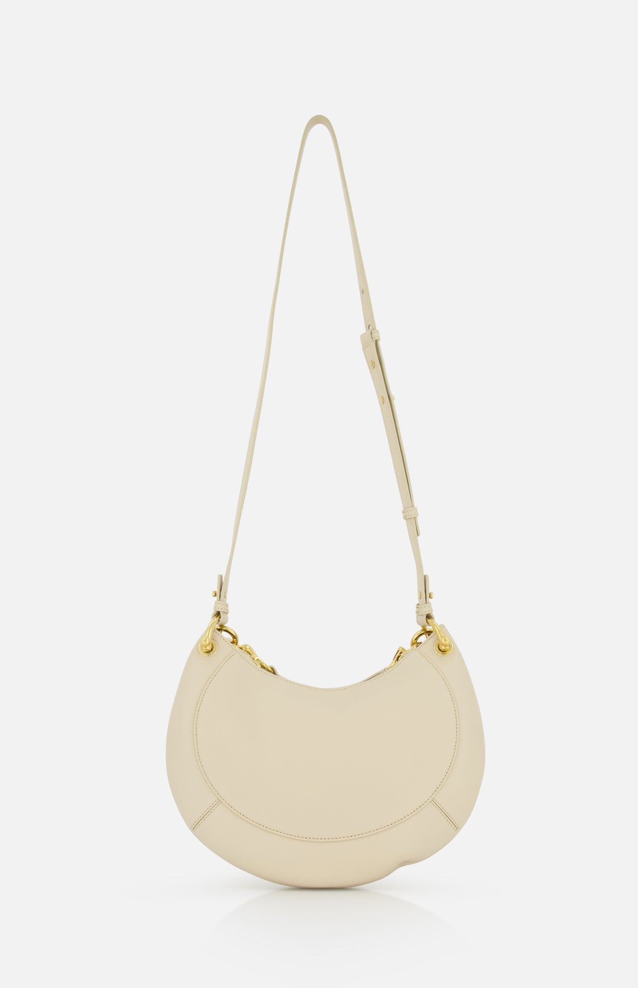 The CHLOÉ Slim Banana Bag is a cream-colored handbag with gold hardware, an adjustable strap, and a leather top handle, shown against a plain white background.