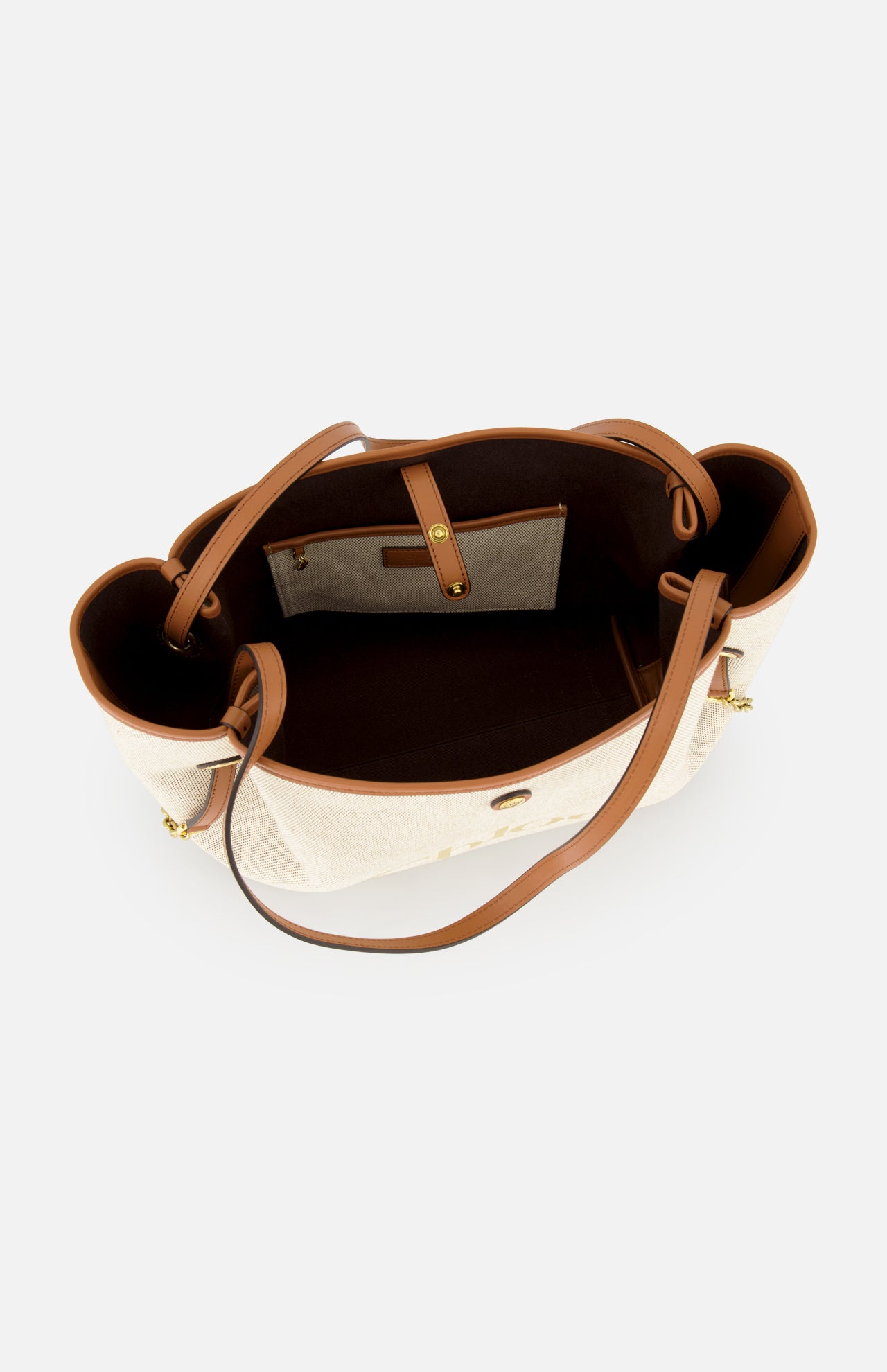 Top view of the open Chloé Cotton Clover Bag by CHLOÉ, crafted from beige cotton with brown leather handles and trim, revealing a spacious dark-lined interior with a zippered pocket and an attached buttoned pouch—ideal as a chic designer office bag.