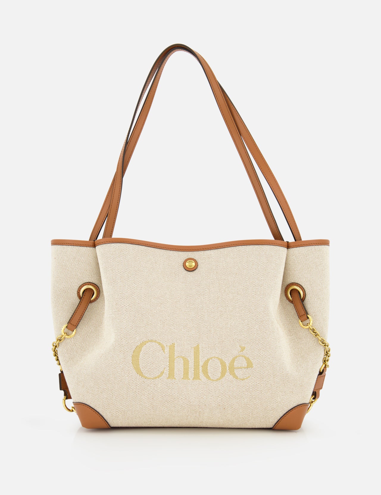 Introducing the Chloé Cotton Clover Bag by CHLOÉ—a beige canvas cotton tote featuring brown leather handles and trim, gold chain accents, and “Chloé” elegantly printed in gold on the front. This versatile designer bag effortlessly blends style and function, making it a perfect choice for the office.