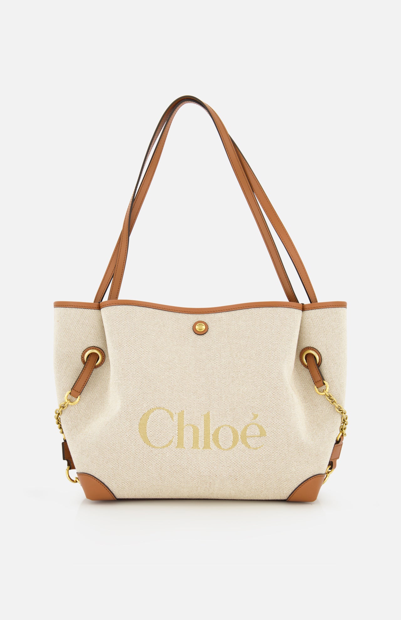 Introducing the Chloé Cotton Clover Bag by CHLOÉ—a beige canvas cotton tote featuring brown leather handles and trim, gold chain accents, and “Chloé” elegantly printed in gold on the front. This versatile designer bag effortlessly blends style and function, making it a perfect choice for the office.