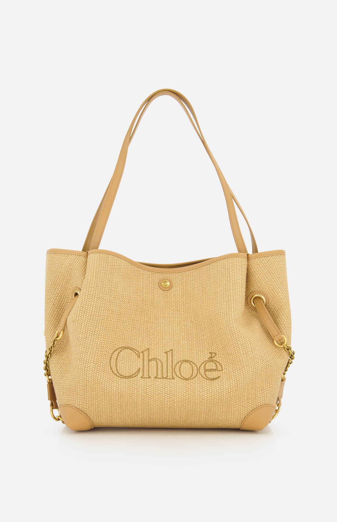 Introducing the Chloé Raffia Clover Bag: a beige woven raffia tote featuring leather handles, gold chain accents, and sleek leather trim. The brand name CHLOÉ is boldly embroidered on the front, complemented by grommet details near the handles and a secure snap closure.