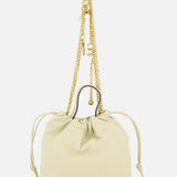 The CHLOÉ Chloé Icons Chain Strap Bag is a small, cream-colored mini shoulder bag featuring knotted ends and a gold chain strap, displayed against a plain white background.
