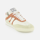 The Chloé Kick Sneakers by CHLOÉ feature a cream and brown design with tan suede accents, white laces, and a logo tag on the tongue. These classic lace-up sneakers offer everyday comfort and style, showcased on a plain white background.