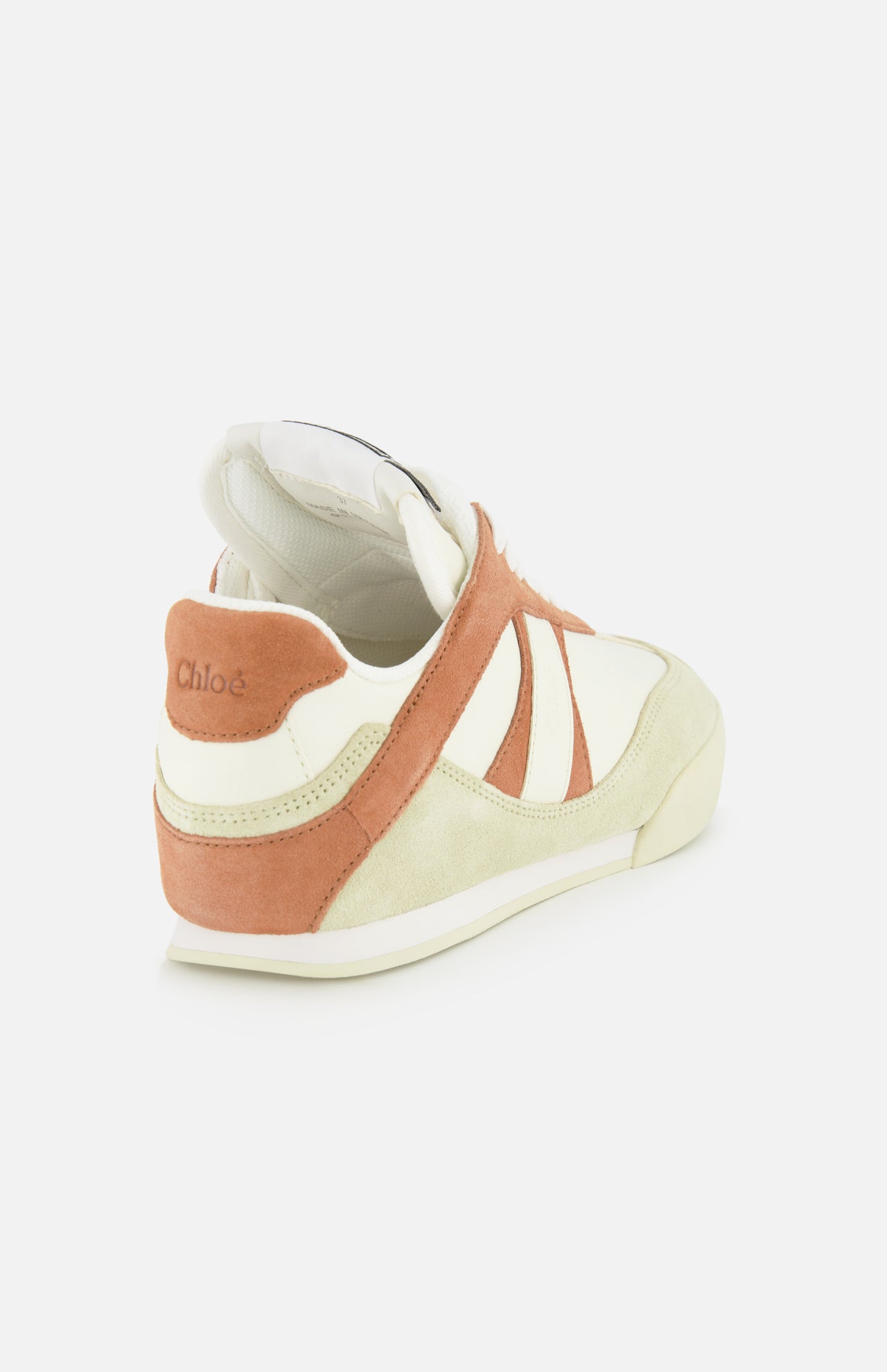 The Chloé Kick Sneakers by CHLOÉ feature cream, beige, and rust suede and leather panels with the brand embossed on the heel, shown from the left rear against a white background—ideal for comfortable sneaker lovers.
