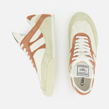 Two cream and brown CHLOÉ Kick Sneakers with tan and beige suede accents are shown against a white background. One sneaker is side-viewed, the other top-viewed, highlighting the Chloé logo on both tongue and insole.