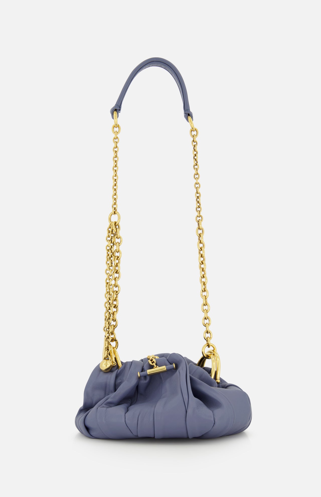 The Chloé Plissé Chain Strap Bag by CHLOÉ is a small lavender designer bag with a ruched, gathered design, gold hardware, a puffy short handle, and a long chain-and-leather strap shown against a plain white background.