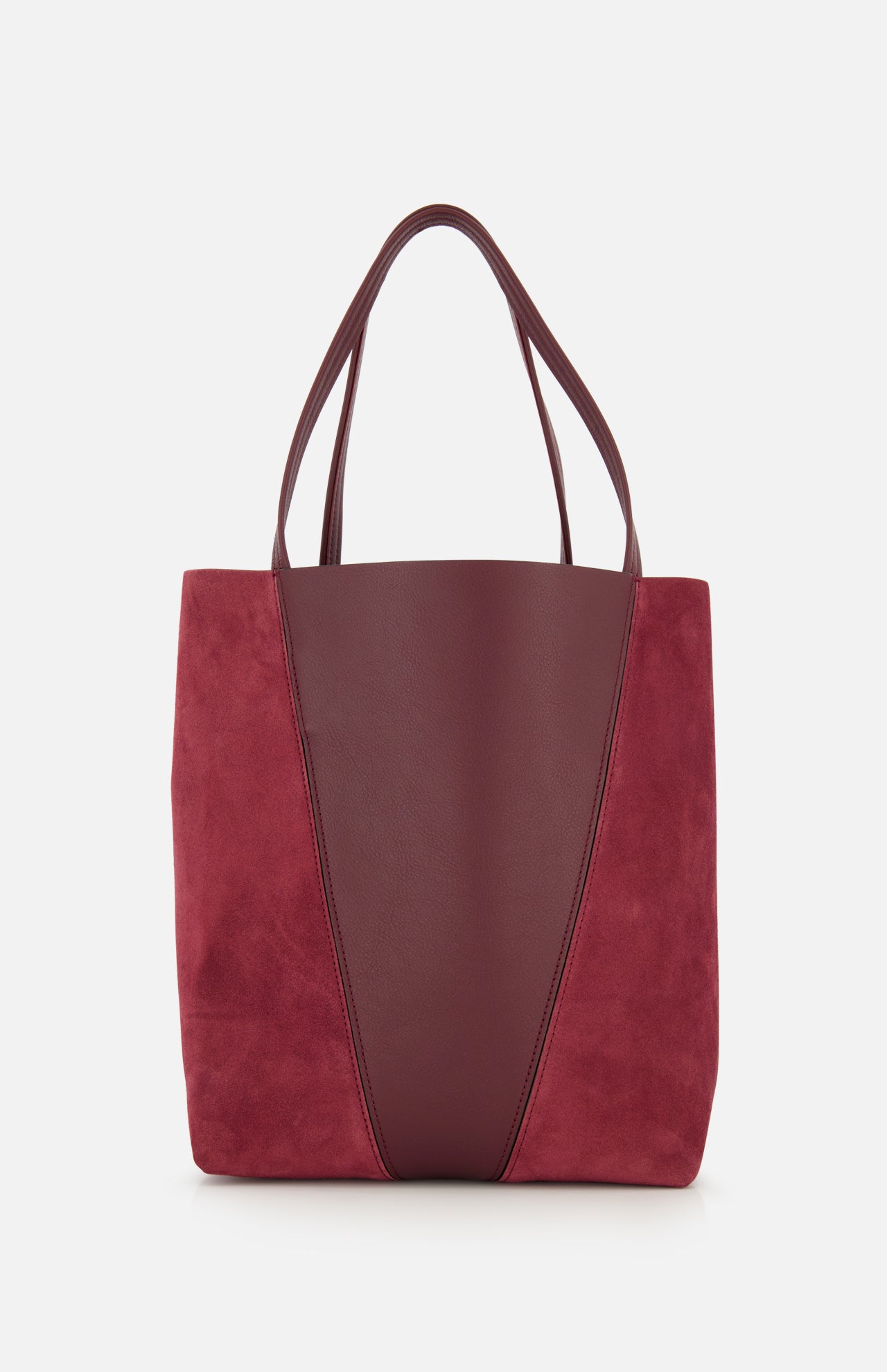 The CHLOÉ Leather and Suede Spin Bag showcases a modern minimalist design with a burgundy leather center panel, suede side panels, two handles, and a removable bag chain for versatile carrying options.