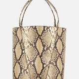 The CHLOÉ Spin Bag with Chain features a brown and beige snakeskin print, dual handles, a structured trapezoidal shape, and is displayed against a plain white background.