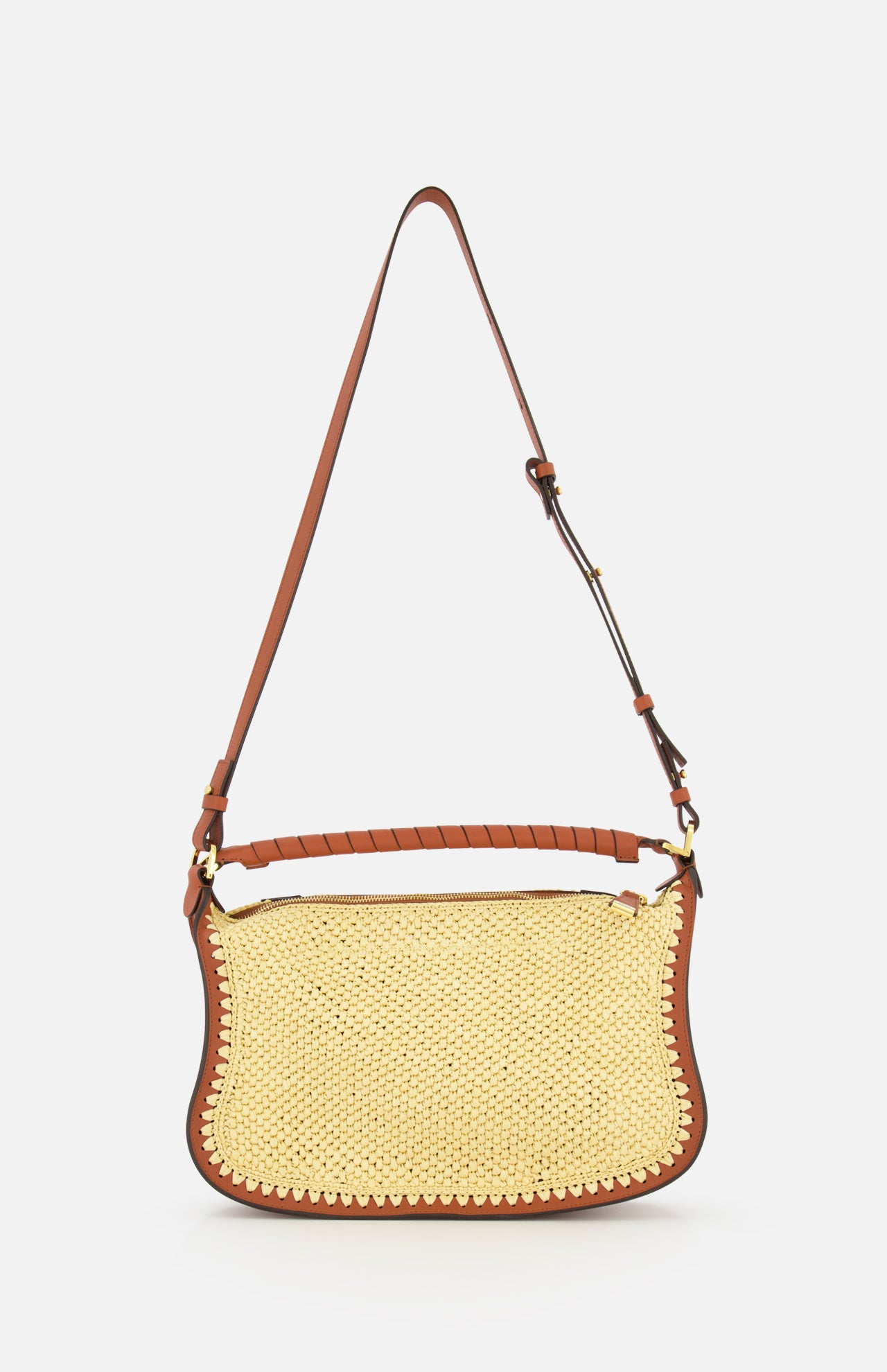 The CHLOÉ Marcie Raffia Effect Shoulder Bag features brown leather trim, an adjustable crossbody strap, and a leather-wrapped top handle, shown against a plain white background.