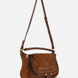 Chloé Marcie Calf Hair Bag in brown calf hair leather featuring an adjustable shoulder strap and gold-tone hardware.