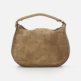 The CHLOÉ Marcie Suede Top Handle Bag is a tan Italian-made day bag with a rounded shape, short wrapped leather handle, and gold-tone hardware, shown against a plain white background.