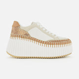 The CHLOÉ Nama Wedge Sneaker features cream and tan leather, textured stitching, white laces, a thick ridged white sole, and a mixed-material upper—ideal for anyone seeking modern statement sneakers.