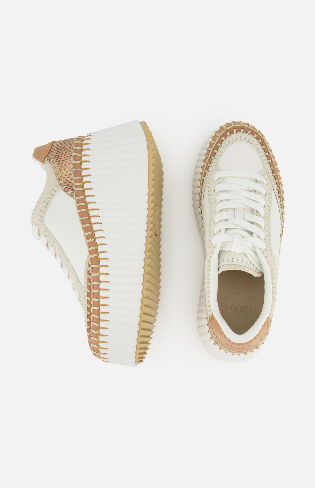 Two Nama Wedge Sneakers by CHLOÉ are shown from top and side views, featuring cream and tan leather with thick ribbed white soles, tan accents, and textured brown details at the heel and toe—perfect statement sneakers.