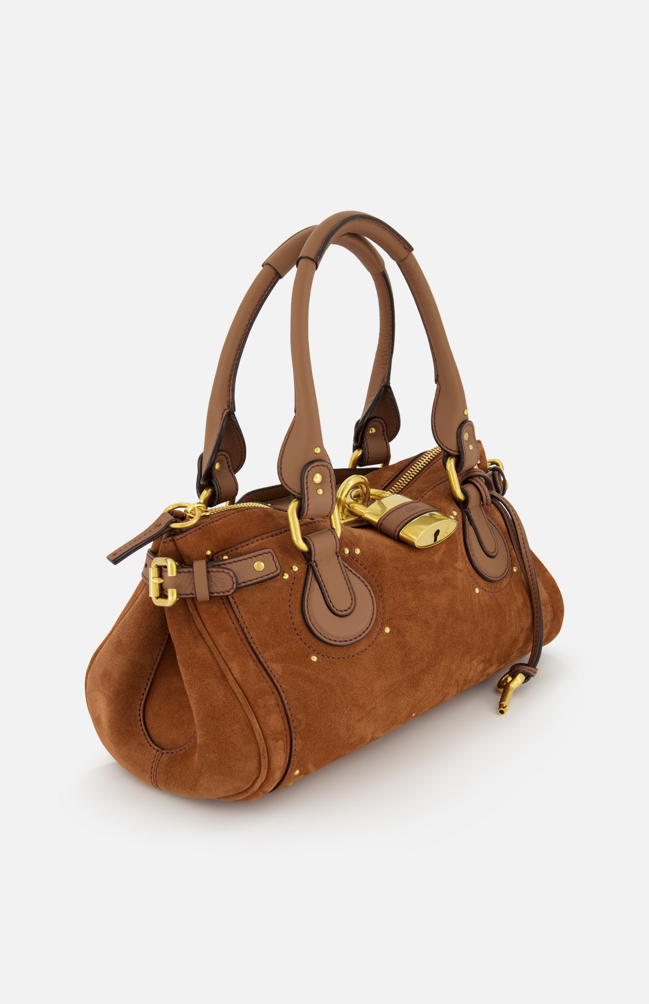The CHLOÉ Suede Paddington Shoulder Bag features brown suede and leather, gold hardware, decorative buckles, an oversized padlock, double handles, and a structured design.
