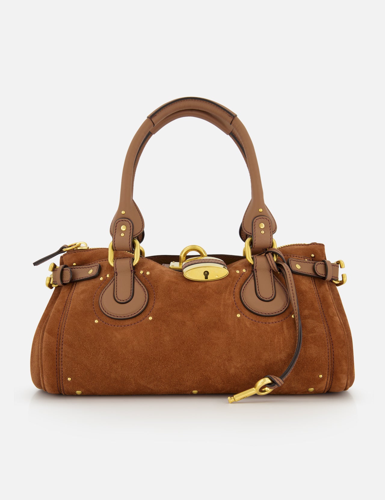 The CHLOÉ Suede Paddington Shoulder Bag features tan brown suede, gold hardware, leather handles and trim, side buckles, an oversized padlock clasp, a structured rounded silhouette, and decorative stitching.