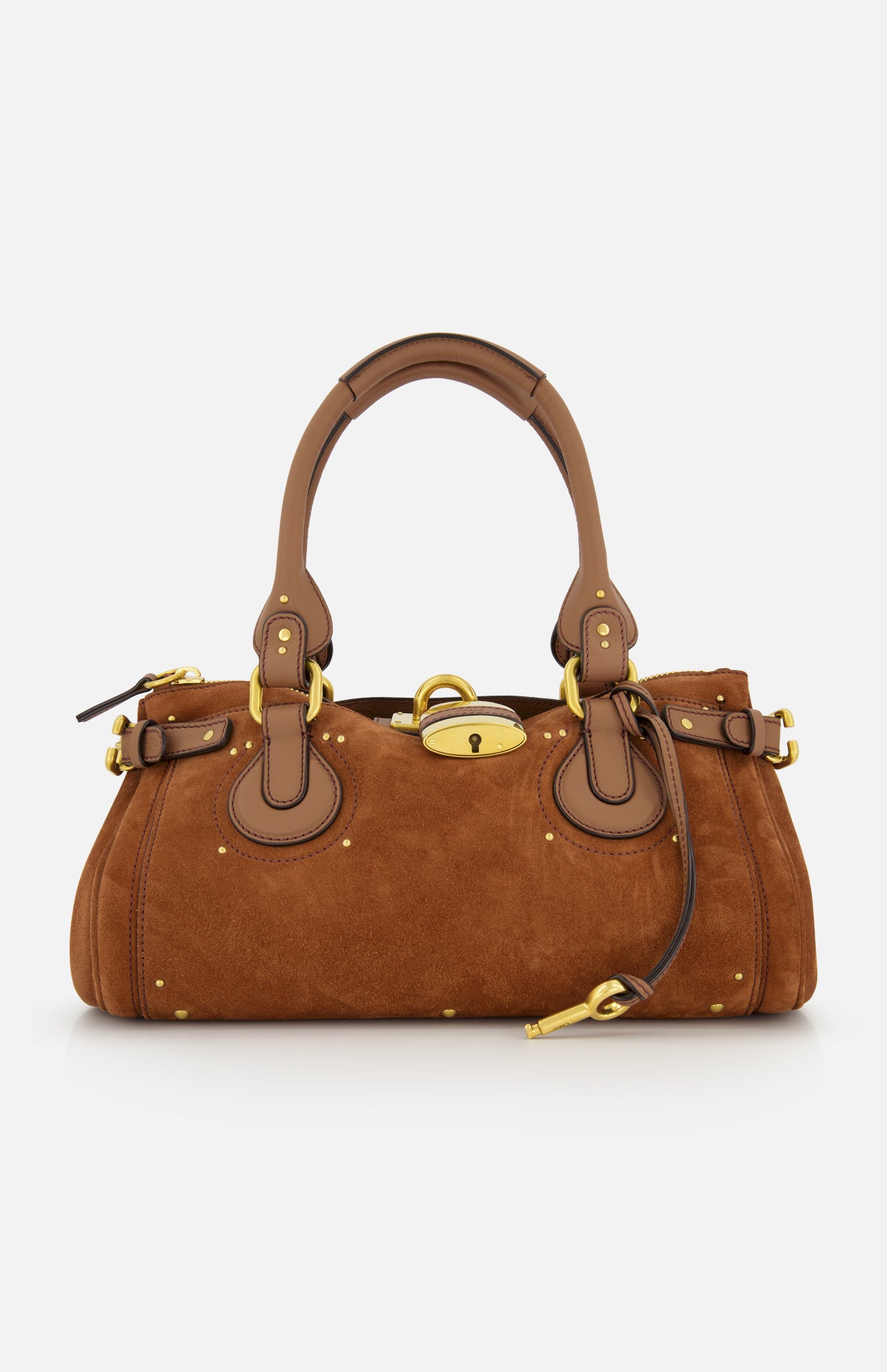 The CHLOÉ Suede Paddington Shoulder Bag features tan brown suede, gold hardware, leather handles and trim, side buckles, an oversized padlock clasp, a structured rounded silhouette, and decorative stitching.