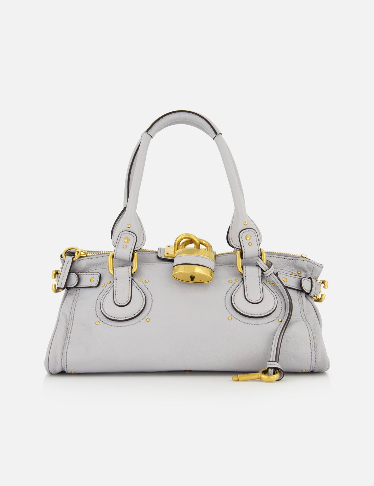The CHLOÉ Paddington Shoulder Bag is a light gray leather handbag featuring two handles, gold hardware, and a prominent oversized padlock detail on the front, reminiscent of the iconic Paddington style.
