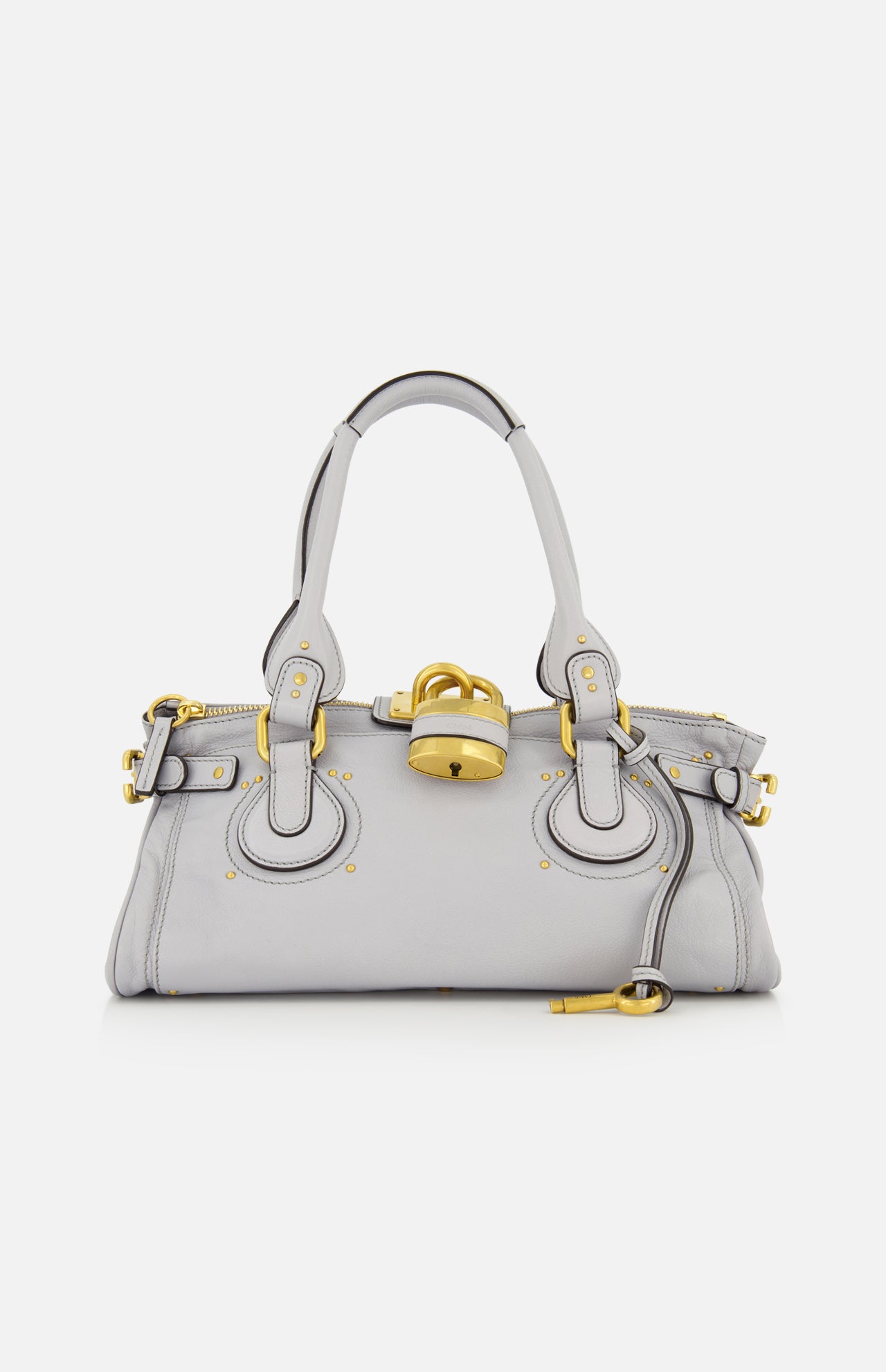 The CHLOÉ Paddington Shoulder Bag is a light gray leather handbag featuring two handles, gold hardware, and a prominent oversized padlock detail on the front, reminiscent of the iconic Paddington style.