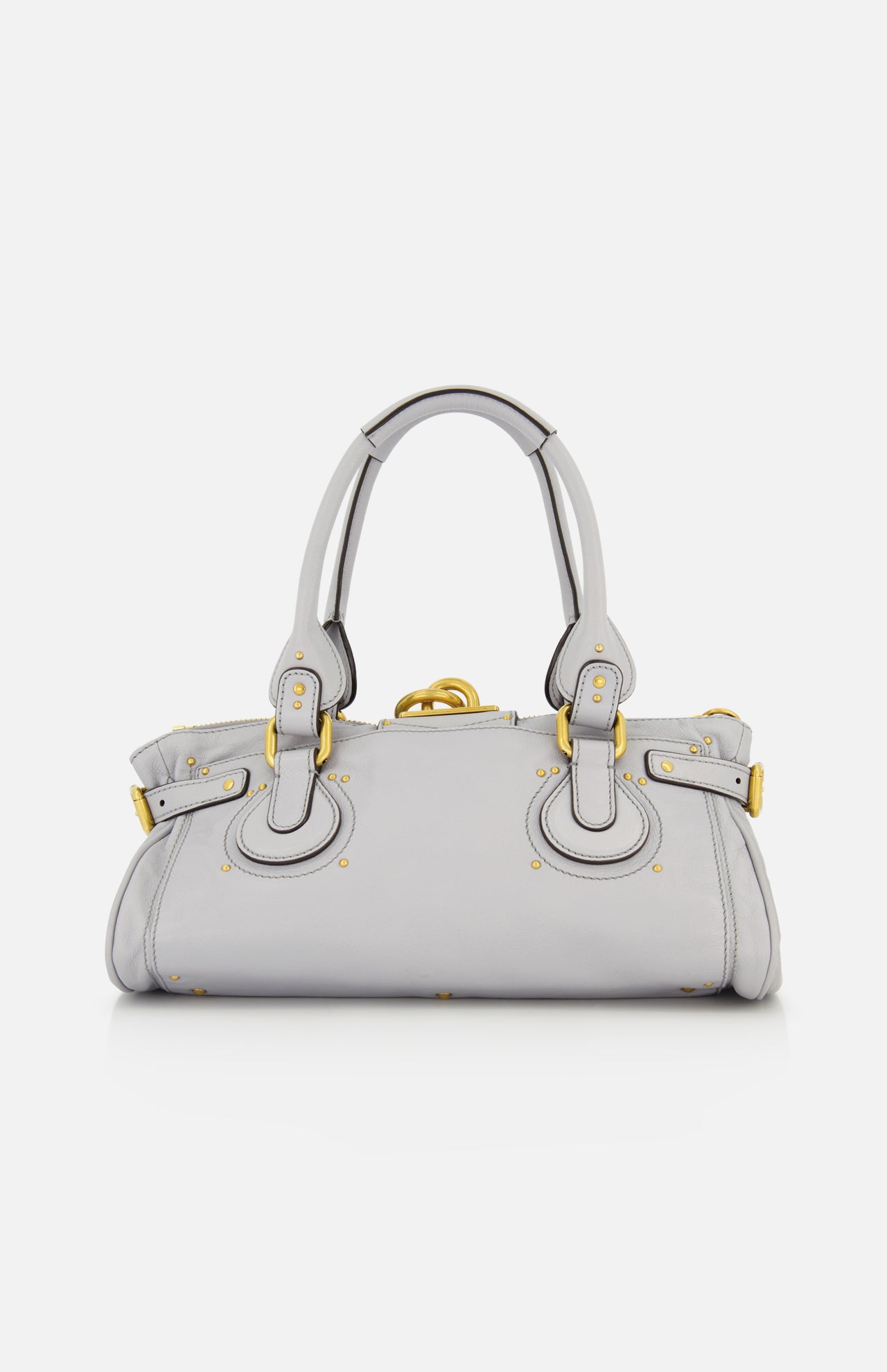 A CHLOÉ Paddington Shoulder Bag in light gray leather, featuring gold hardware, double handles, decorative buckles, subtle stitching details, and an oversized padlock accent, displayed against a plain white background.