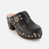 CHLOÉ Talis Studded Leather Clogs in black, featuring a wooden platform heel and decorative silver-tone studs.