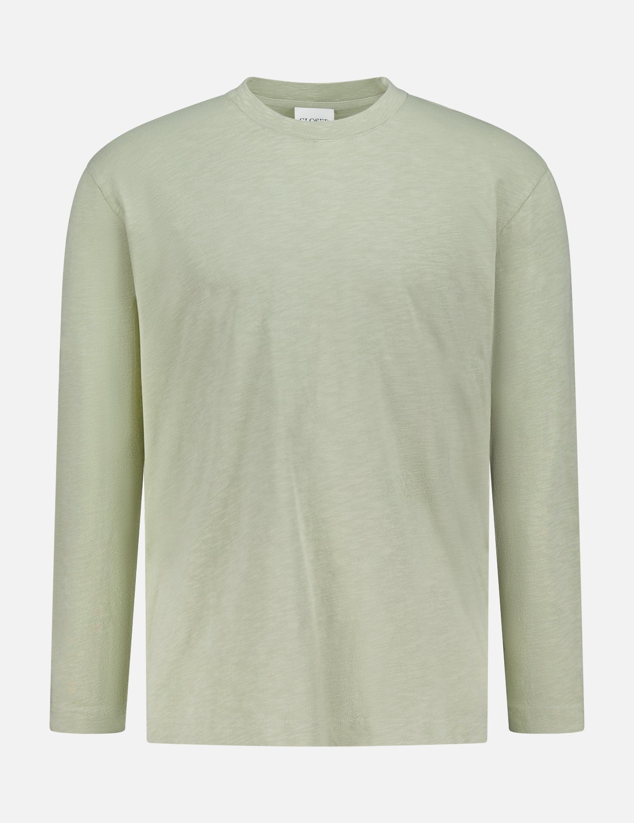 The CLOSED Classic Long Sleeve T-shirt, shown in light green on a plain white background, is made from 100% cotton. Featuring a crew neck and relaxed fit, it’s perfect for casual wear with no visible patterns or logos.