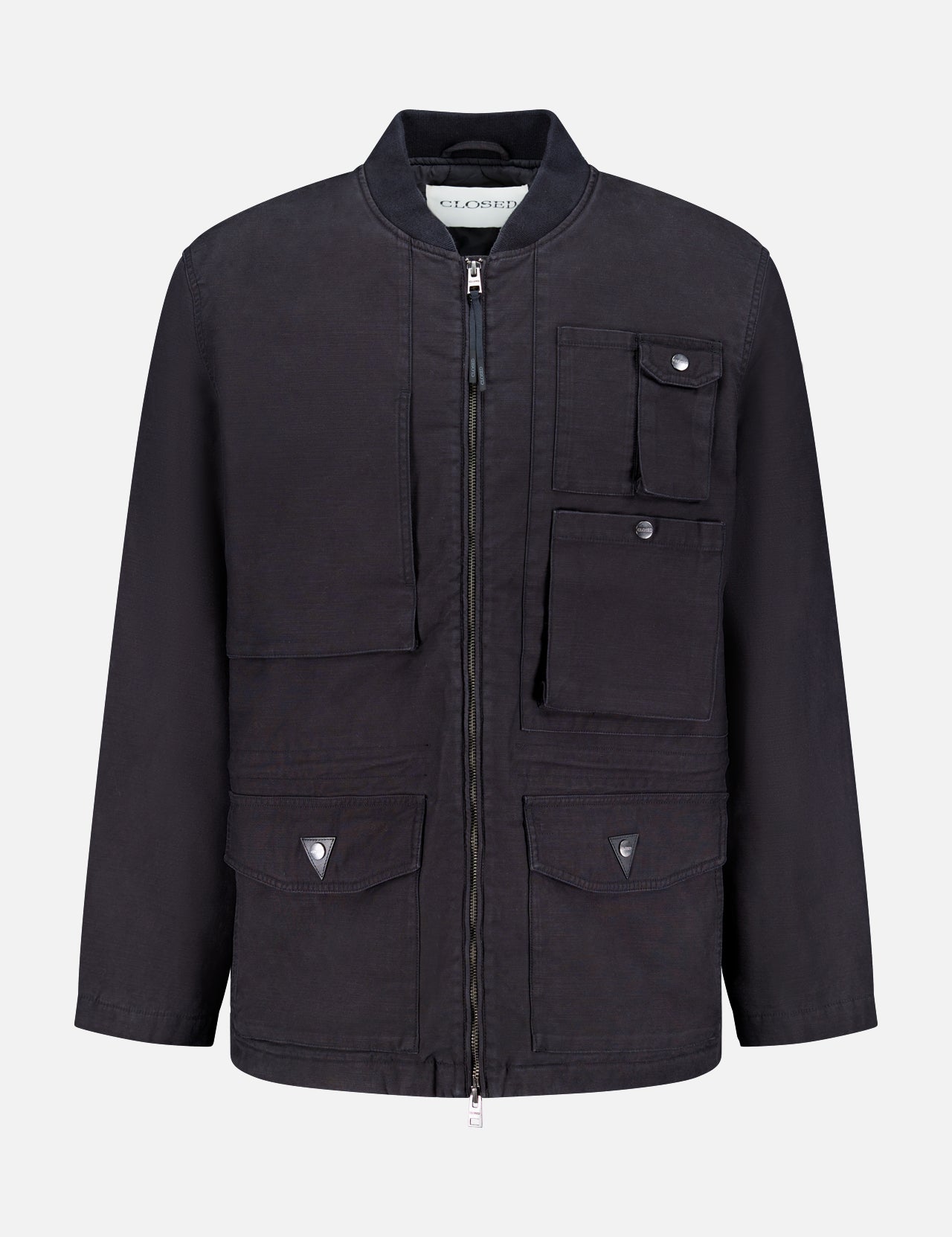 The CLOSED Multi Pocketed Vintage Field Jacket in washed black features a front zipper, multiple flap and snap-button pockets on the chest and lower front, and a collarless neckline. Shown against a plain white background.