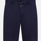 The CLOSED Classic Chino Shorts in navy stretch cotton twill feature belt loops, a button and zip closure, and side pockets, shown against a white background.