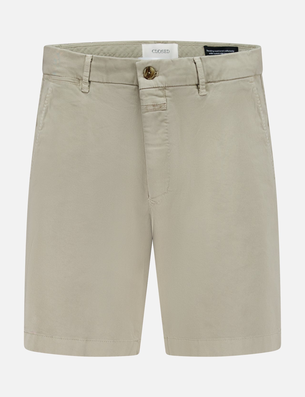 The CLOSED Classic Chino Shorts in beige are made from stretch cotton twill with belt loops, side pockets, and a front button and zip closure, shown against a white background.