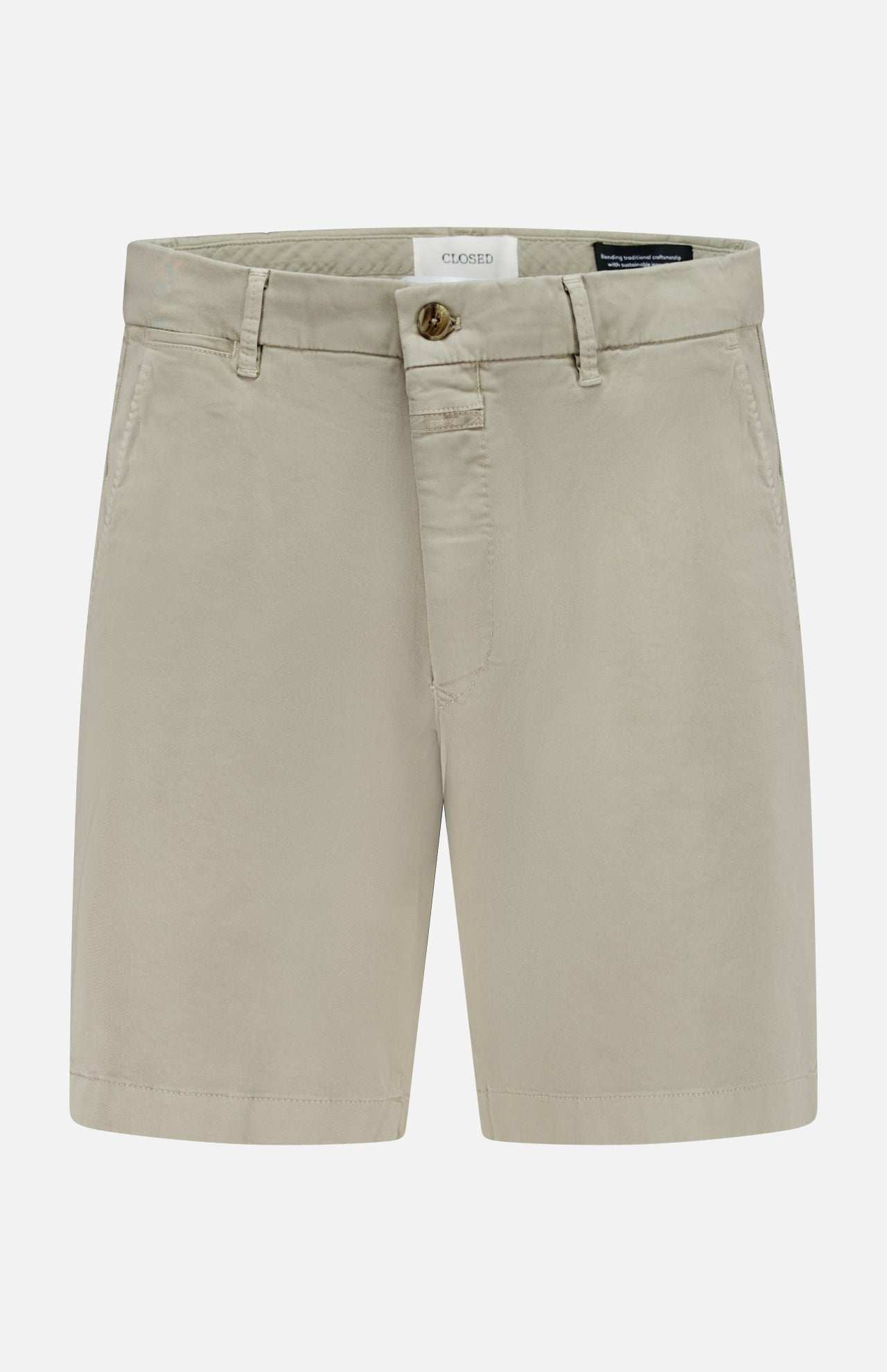 The CLOSED Classic Chino Shorts in beige are made from stretch cotton twill with belt loops, side pockets, and a front button and zip closure, shown against a white background.