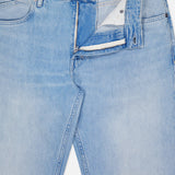The Cooper True Straight Leg Denim jeans by CLOSED are crafted from sustainable denim in Italy. Shown here in light blue, the jeans feature a straight leg silhouette with the fly partially unzipped to reveal the inner fabric and button closure. The waistband displays a CLOSED-branded tag, and the jeans are laid flat on a white background.